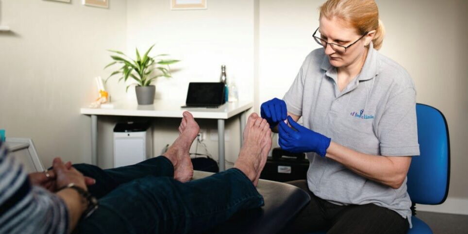 Catherine Fletcher-Liddell with a patient at CF Foot Clinic Basingstoke