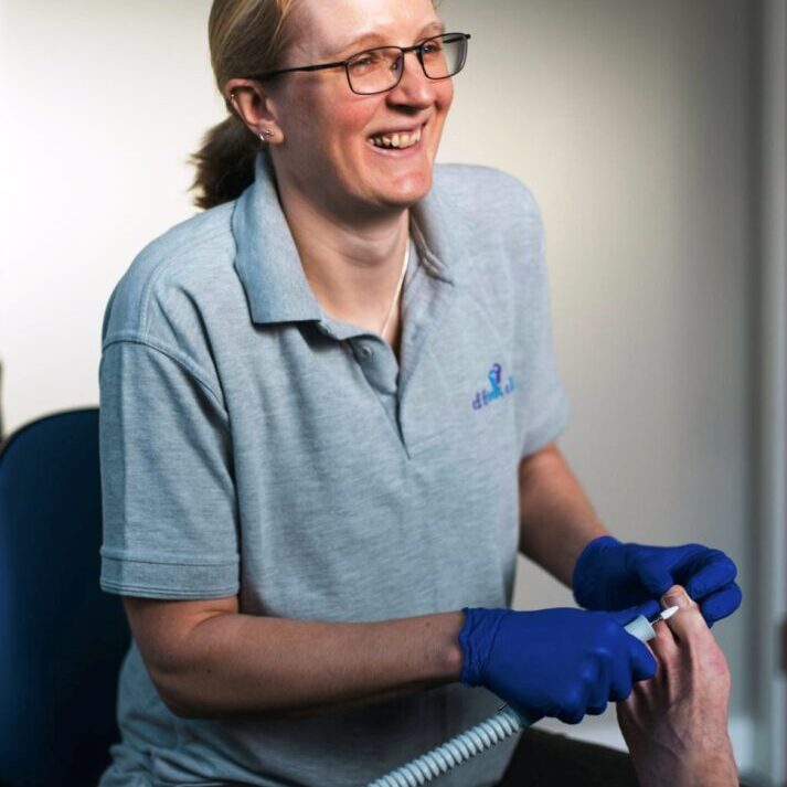 Catherine Fletcher-Liddell treating a patient at CF Foot Clinic Basingstoke